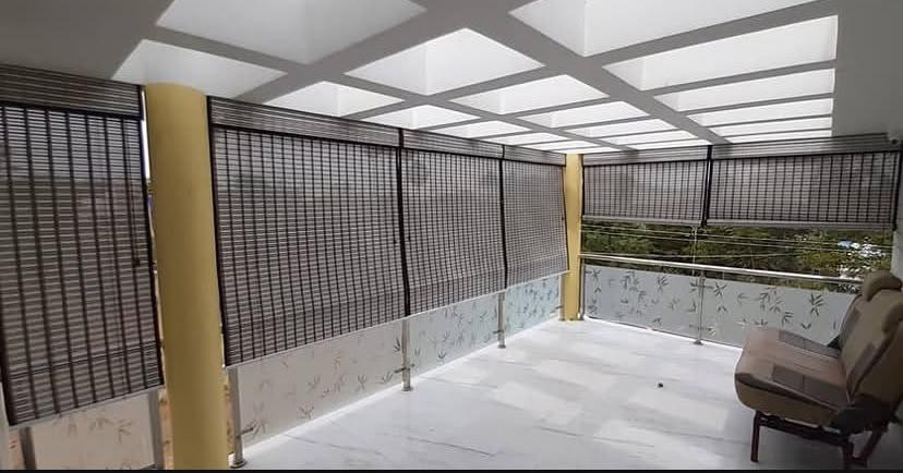 Exterior bamboo blinds installed on veranda balcony