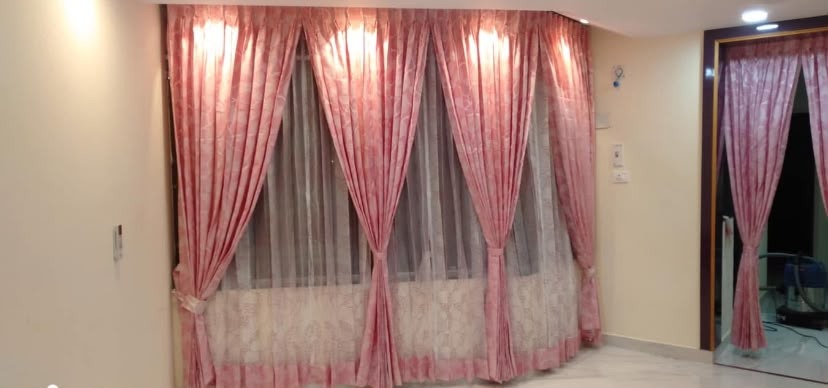 Pink layered curtains with sheers