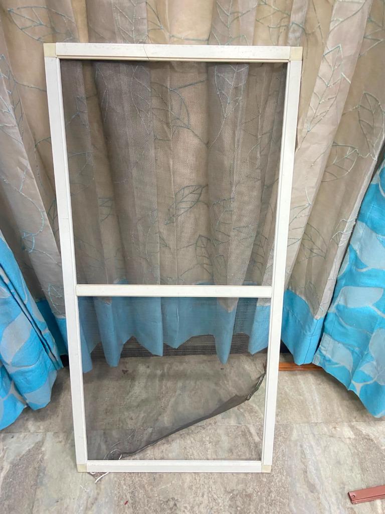White framed mosquito net panel window installation